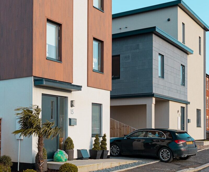 brown and white concrete building under blue sky during daytime
